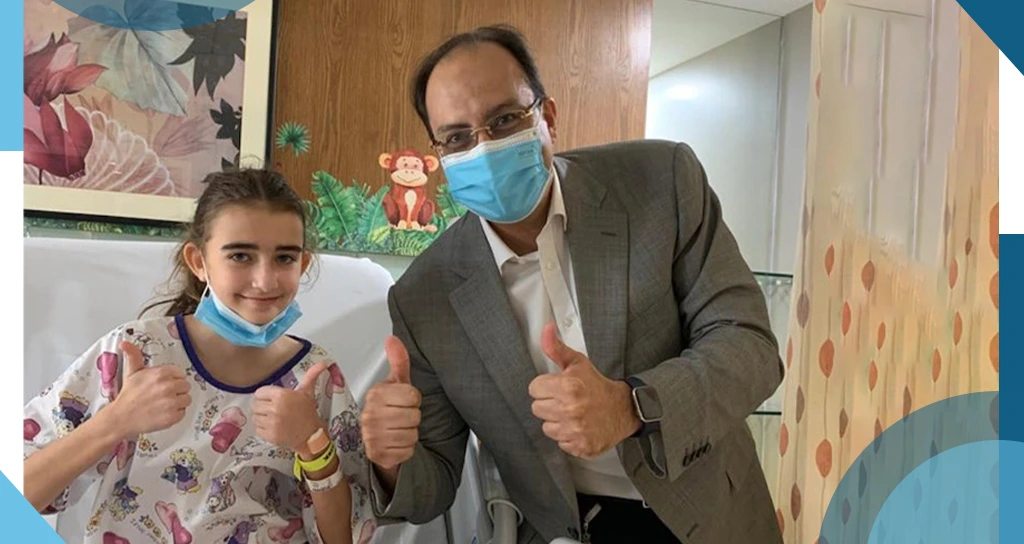 Dr. Mohamed Mashhour with Little Girl Patient